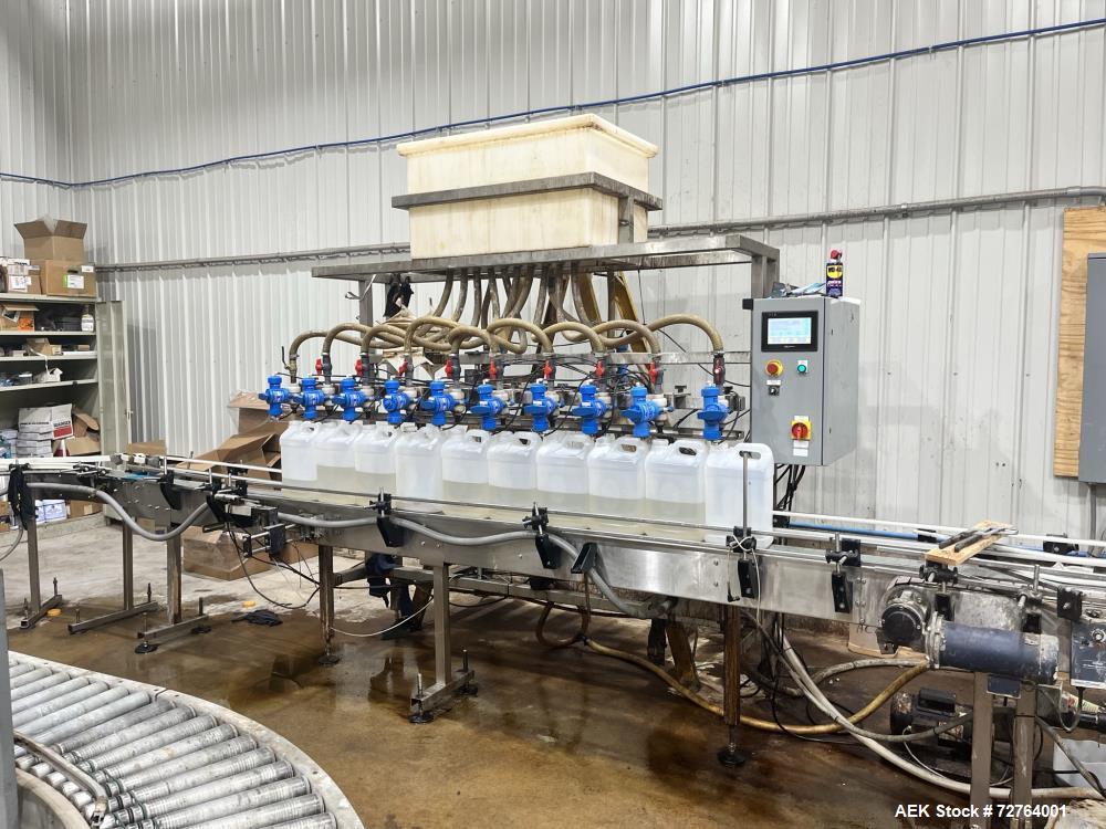 Used Inline Filling Systems Complete Liquid Filling Line. Line Consists of 10 Head Inline Fillers, Kapsall Model A6-R Capper with Integrated Cap Elevator and Centrifugal Cap Sorter, Dual Belt, Kapsal...