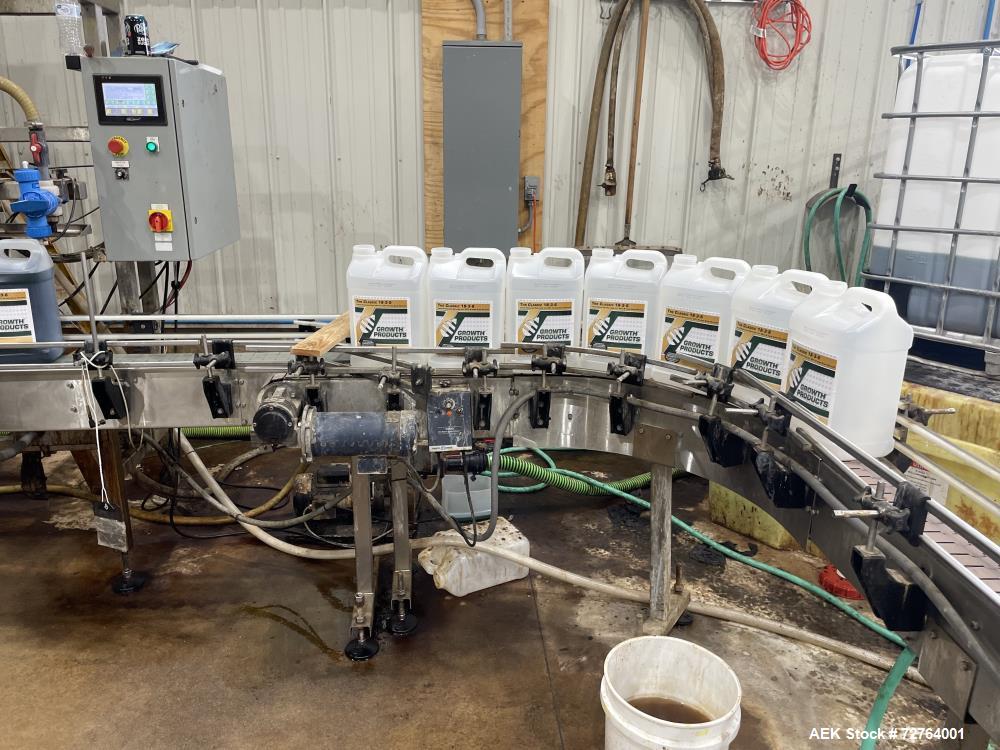 Used Inline Filling Systems Complete Liquid Filling Line. Line Consists of 10 Head Inline Fillers, Kapsall Model A6-R Capper with Integrated Cap Elevator and Centrifugal Cap Sorter, Dual Belt, Kapsal...