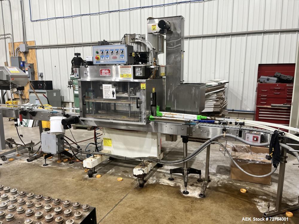 Used Inline Filling Systems Complete Liquid Filling Line. Line Consists of 10 Head Inline Fillers, Kapsall Model A6-R Capper with Integrated Cap Elevator and Centrifugal Cap Sorter, Dual Belt, Kapsal...