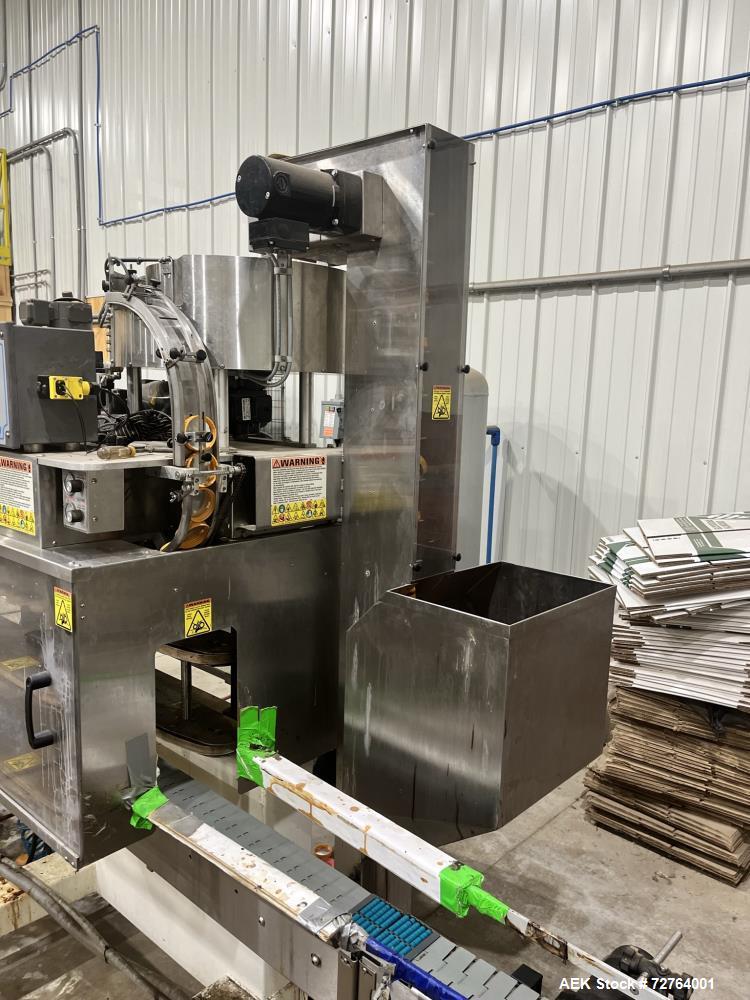 Used Inline Filling Systems Complete Liquid Filling Line. Line Consists of 10 Head Inline Fillers, Kapsall Model A6-R Capper with Integrated Cap Elevator and Centrifugal Cap Sorter, Dual Belt, Kapsal...