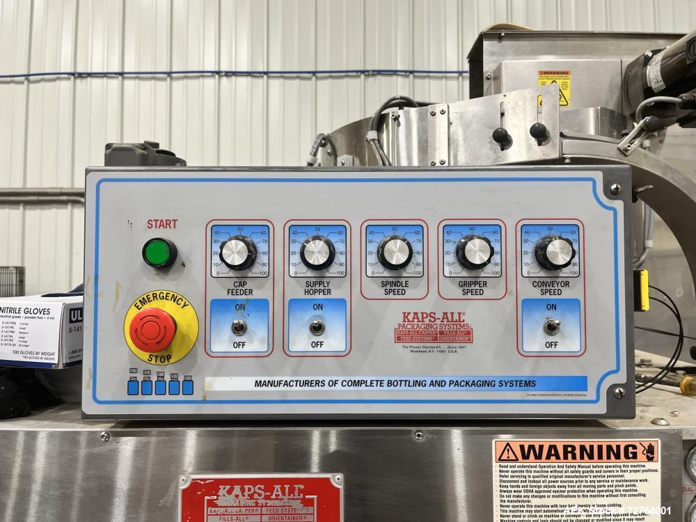 Used Inline Filling Systems Complete Liquid Filling Line. Line Consists of 10 Head Inline Fillers, Kapsall Model A6-R Capper with Integrated Cap Elevator and Centrifugal Cap Sorter, Dual Belt, Kapsal...