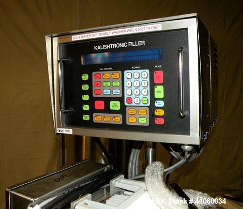 Used Kalish Liquid Bottle Filling Lineconsisting of: (1) Kalishtronic 8 head inline bottom up filler, Model KT12. (8) 5/8’’ diameter x 8-7/8’’ long diving nozzles, set up for approximately 946 ml. (8...