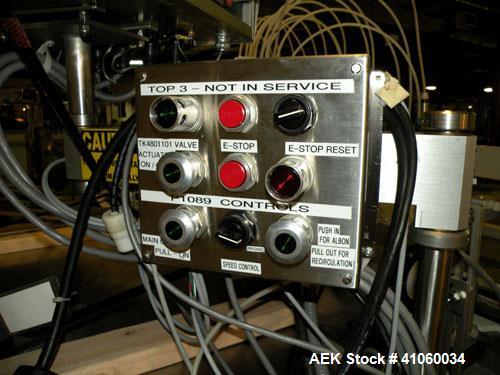 Used Kalish Liquid Bottle Filling Lineconsisting of: (1) Kalishtronic 8 head inline bottom up filler, Model KT12. (8) 5/8’’ diameter x 8-7/8’’ long diving nozzles, set up for approximately 946 ml. (8...