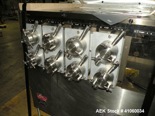 Used Kalish Liquid Bottle Filling Lineconsisting of: (1) Kalishtronic 8 head inline bottom up filler, Model KT12. (8) 5/8’’ diameter x 8-7/8’’ long diving nozzles, set up for approximately 946 ml. (8...