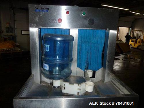 Used Norland 5 Gallon Bottle Water Filling Line capable of filling up to 150 bottles per hour.  Norland BW150 bottle washer, compact design, stainless steel construction, recirculated wash and saniti...