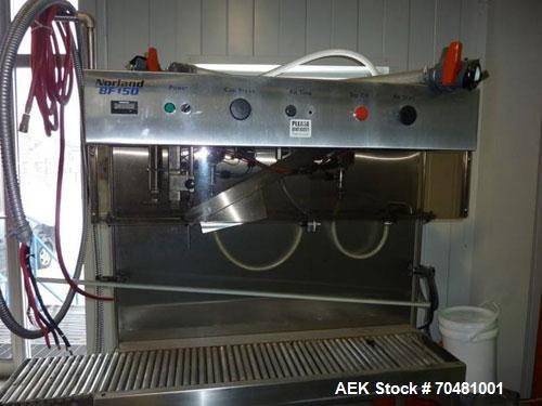 Used Norland 5 Gallon Bottle Water Filling Line capable of filling up to 150 bottles per hour.  Norland BW150 bottle washer, compact design, stainless steel construction, recirculated wash and saniti...