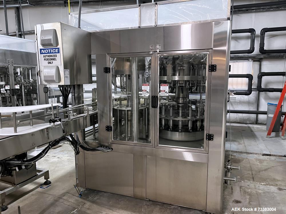 Used Complete Filling line for Bottle, manufactured by Norland. Running 25oz Bottles
