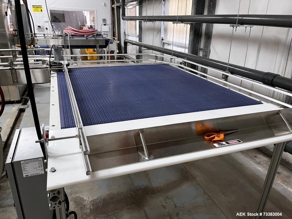 Used Complete Filling line for Bottle, manufactured by Norland. Running 25oz Bottles