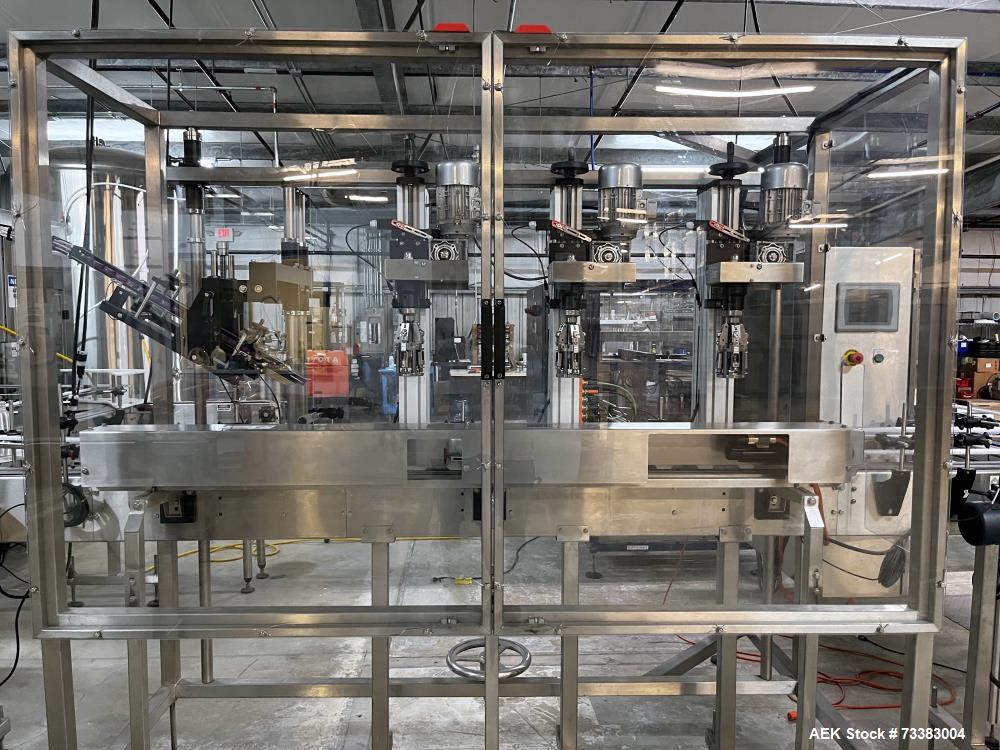 Used Complete Filling line for Bottle, manufactured by Norland. Running 25oz Bottles