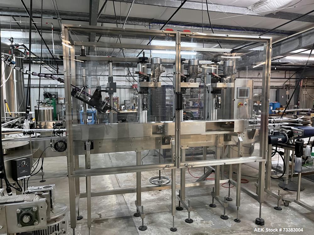 Used Complete Filling line for Bottle, manufactured by Norland. Running 25oz Bottles