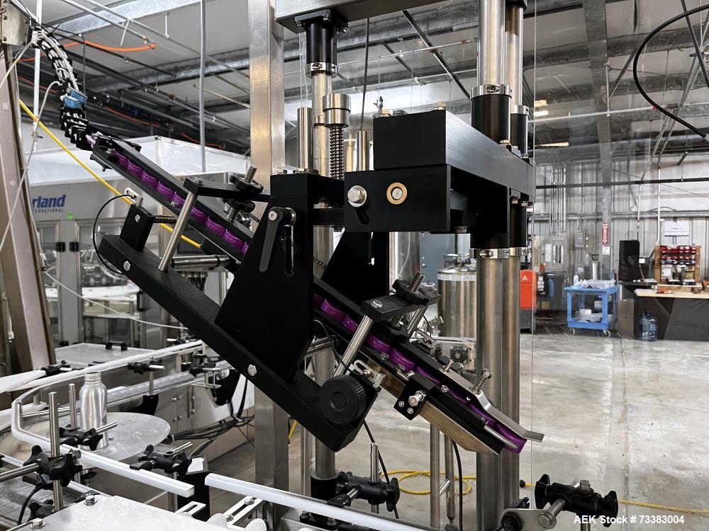 Used Complete Filling line for Bottle, manufactured by Norland. Running 25oz Bottles