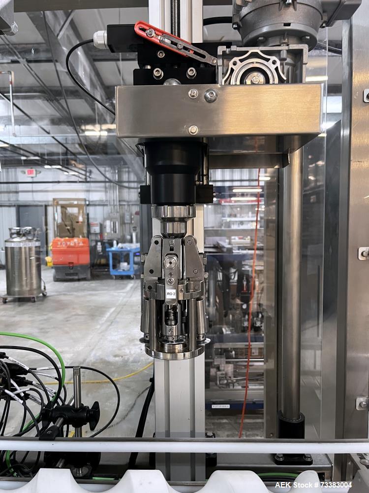 Used Complete Filling line for Bottle, manufactured by Norland. Running 25oz Bottles