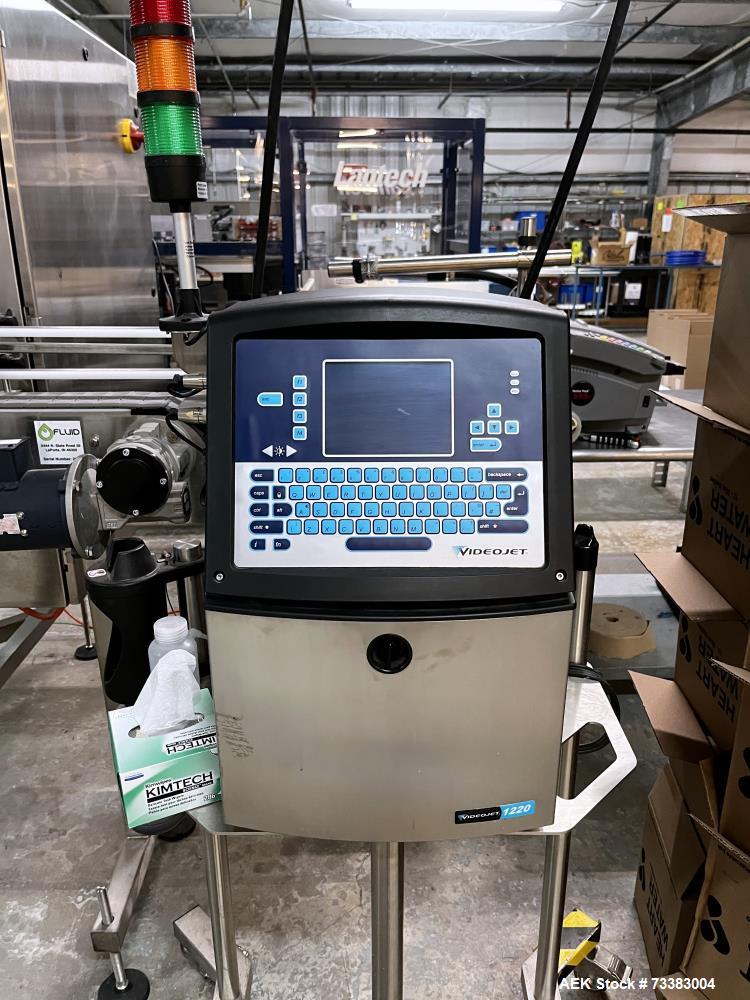 Used Complete Filling line for Bottle, manufactured by Norland. Running 25oz Bottles