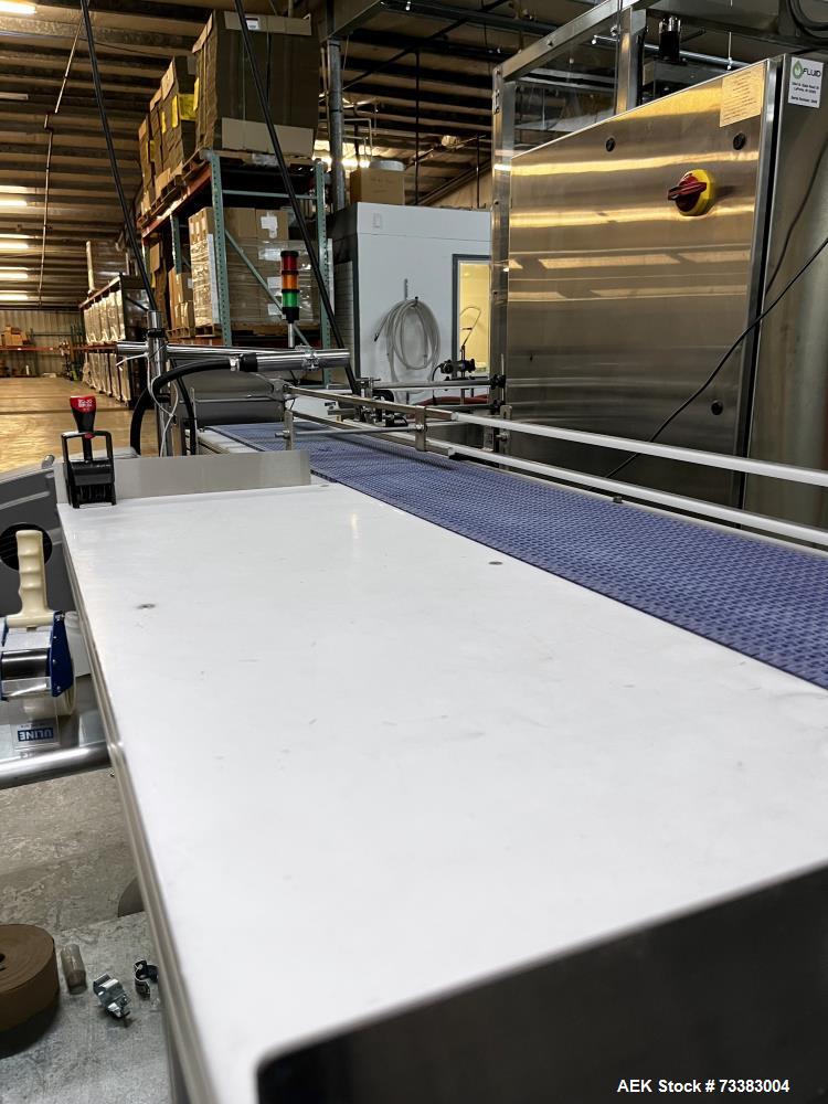 Used Complete Filling line for Bottle, manufactured by Norland. Running 25oz Bottles