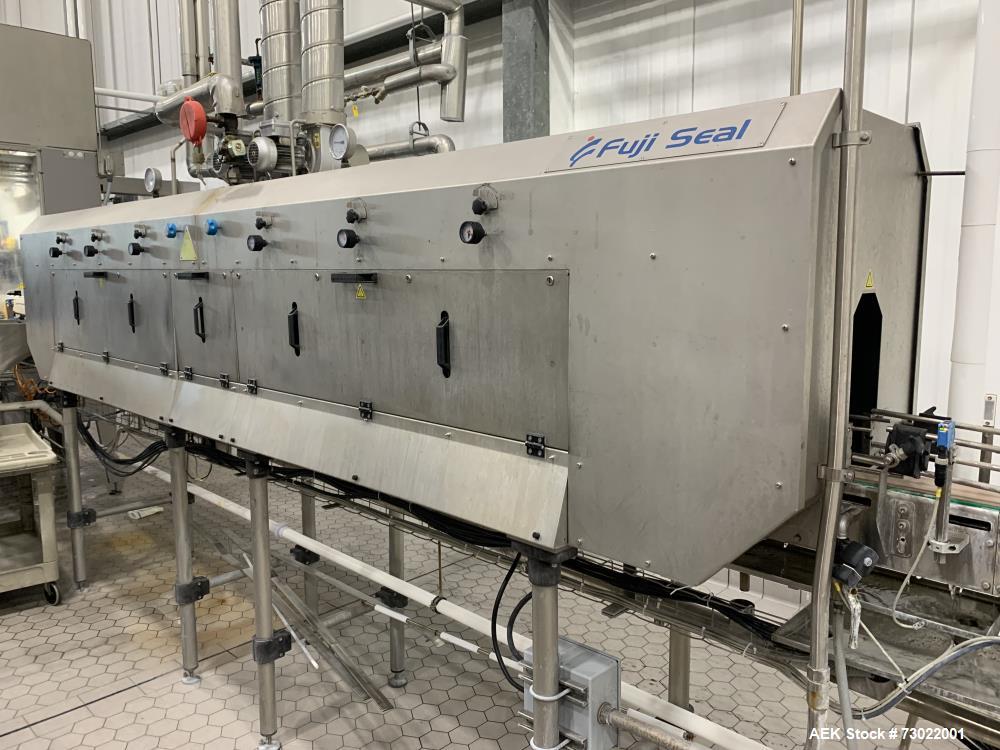 Complete Sidel ESL Bottle Filling Line with Blow Molder, Capper, Sleeving & Casing