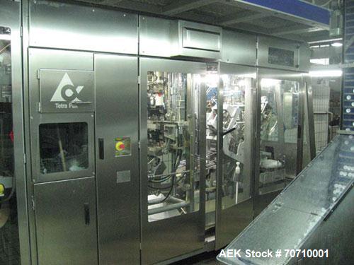 Used Tetra Pak Tetra Top TT3 Filling Machine.  Maximum capacity 9,000 units per hour, 3/50 hz/400V, filling volumes 0.13, 0.19 or 0.26 gallons (500, 750, 1000 ml), (2) Tetra cappers, CE certified.