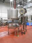 Used Hot Fill Beverage Line capable of up to 600 bottles per minute, comprised of the following equipment: Sentry model 5022 depalletizer; Alliance lowerator; Filler Specialties monobloc 54 head fill...