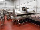 Used Hot Fill Beverage Line capable of up to 600 bottles per minute, comprised of the following equipment: Sentry model 5022 depalletizer; Alliance lowerator; Filler Specialties monobloc 54 head fill...