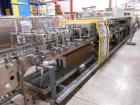 Used Hot Fill Beverage Line capable of up to 600 bottles per minute, comprised of the following equipment: Sentry model 5022 depalletizer; Alliance lowerator; Filler Specialties monobloc 54 head fill...