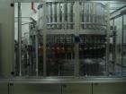 Línea de producción utiliza bebida completa. Consta de: Krones Contiform soplado máquina, modelo 112-10. Máquina para botell...