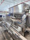 Used Acasi Model Tru-PI-12-V Automatic Inline Piston Filling Line Last Running Sauces. Consists of (2) Acasi Model Tru-12-VS Fillers, Resina Model NRC 40 inline quill capper, Acasi Trucap8-Vib capper...