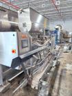Used Acasi Model Tru-PI-12-V Automatic Inline Piston Filling Line Last Running Sauces. Consists of (2) Acasi Model Tru-12-VS Fillers, Resina Model NRC 40 inline quill capper, Acasi Trucap8-Vib capper...