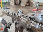 Used Acasi Model Tru-PI-12-V Automatic Inline Piston Filling Line Last Running Sauces. Consists of (2) Acasi Model Tru-12-VS Fillers, Resina Model NRC 40 inline quill capper, Acasi Trucap8-Vib capper...