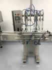 Used Acasi Automatic Filling Line – 8-Piston Filler, Capper, Labeler, Rinser, and Accumulation Table