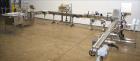 Used Accutek 6 Automatic Vacuum Liquid Filling Line for Glass Containers.