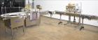Used Accutek 6 Automatic Vacuum Liquid Filling Line for Glass Containers.