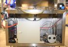 Used Accutek 6 Automatic Vacuum Liquid Filling Line for Glass Containers.