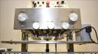 Used Accutek 6 Automatic Vacuum Liquid Filling Line for Glass Containers.