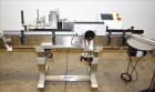 Used Accutek 6 Automatic Vacuum Liquid Filling Line for Glass Containers.