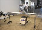 Used Accutek 6 Automatic Vacuum Liquid Filling Line for Glass Containers.