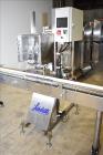 Used- Accutek 6 Automatic Vacuum Liquid Filling Line for Glass Containers.