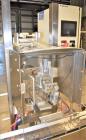 Used Accutek 6 Automatic Vacuum Liquid Filling Line for Glass Containers.