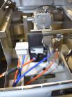 Used Accutek 6 Automatic Vacuum Liquid Filling Line for Glass Containers.