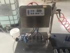 Used Accutek Table Top Filling System, semi-auto operation, consisting of; Mini-Pinch (Six Head) Timed Flow Volumetric Filler, with Adjustable Table Top Stand, Fill Wand, Individual Flow Control Adju...