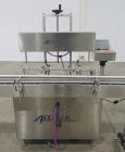 Complete Accutek Filling Line with Rotary Tables & Conveyor System