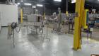 Used Alcoa 8 Head Inline Pressure Gravity Filling And Sleeving Line