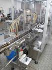 Used Bosch MRF 1010 Bottle Filling/Closing Machine. Filling range 0.1 - 8.5 fl oz (0.5 - 250 ml), output 3,000 bottles an hour. 4 Filling stations with rotary slide piston pumps, capper, torque-screw...