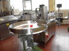 Used Breitner/Geset Bottle Filling Line for conducive liquids.  Maximum output 60-80 objects per minute, 230/400V/50 hz.  Consists of:  (1) Breitner IDL 2065 filling machine, built 1994, with 6 induc...