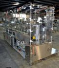 Used Capmatic Straight Line Automatic “Puck Style” Fragrance Line, Model Patriot L, S/N PA03101111, new 2004.  3/60/480V/20A.  6 Head Straight Line Vacuum Filler, Model Vacufill, S/N RV03101110, with...