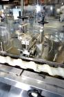Used Capmatic Straight Line Automatic “Puck Style” Fragrance Line, Model Patriot L, S/N PA03101111, new 2004.  3/60/480V/20A.  6 Head Straight Line Vacuum Filler, Model Vacufill, S/N RV03101110, with...