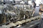 Used Capmatic Straight Line Automatic “Puck Style” Fragrance Line, Model Patriot L, S/N PA03101111, new 2004.  3/60/480V/20A.  6 Head Straight Line Vacuum Filler, Model Vacufill, S/N RV03101110, with...