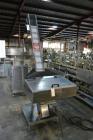 Used Capmatic Straight Line Automatic “Puck Style” Fragrance Line, Model Patriot L, S/N PA03101111, new 2004.  3/60/480V/20A.  6 Head Straight Line Vacuum Filler, Model Vacufill, S/N RV03101110, with...