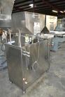 Used Capmatic Straight Line Automatic “Puck Style” Fragrance Line, Model Patriot L, S/N PA03101111, new 2004.  3/60/480V/20A.  6 Head Straight Line Vacuum Filler, Model Vacufill, S/N RV03101110, with...