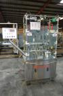 Used Capmatic Straight Line Automatic “Puck Style” Fragrance Line, Model Patriot L, S/N PA03101111, new 2004.  3/60/480V/20A.  6 Head Straight Line Vacuum Filler, Model Vacufill, S/N RV03101110, with...