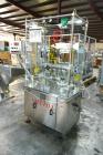 Used Capmatic Straight Line Automatic “Puck Style” Fragrance Line, Model Patriot L, S/N PA03101111, new 2004.  3/60/480V/20A.  6 Head Straight Line Vacuum Filler, Model Vacufill, S/N RV03101110, with...