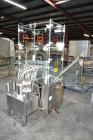 Used Capmatic Straight Line Automatic “Puck Style” Fragrance Line, Model Patriot L, S/N PA03101111, new 2004.  3/60/480V/20A.  6 Head Straight Line Vacuum Filler, Model Vacufill, S/N RV03101110, with...